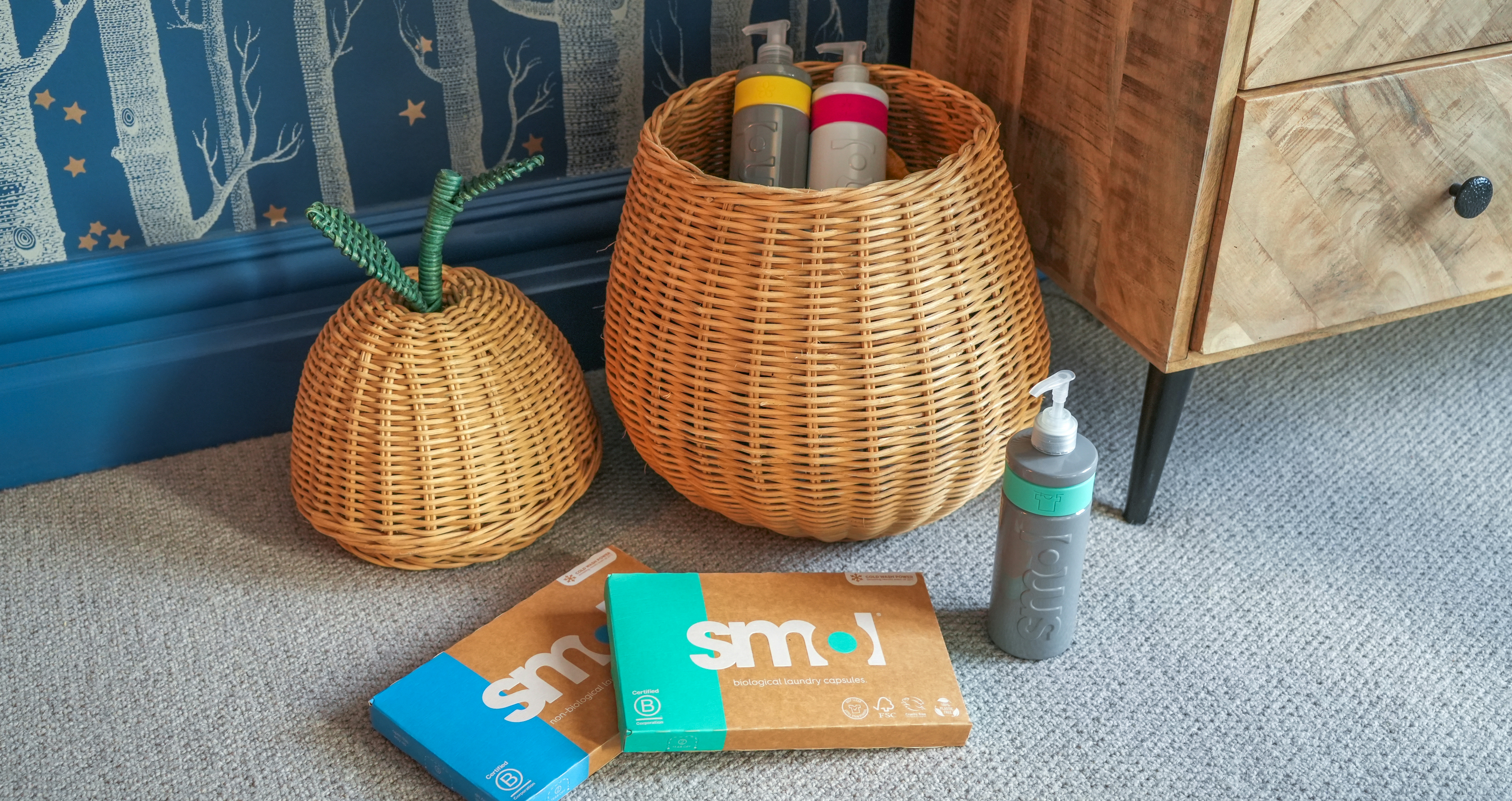 smol laundry collection: laundry capsules, laundry liquid, fabric conditioner, and stain gel.