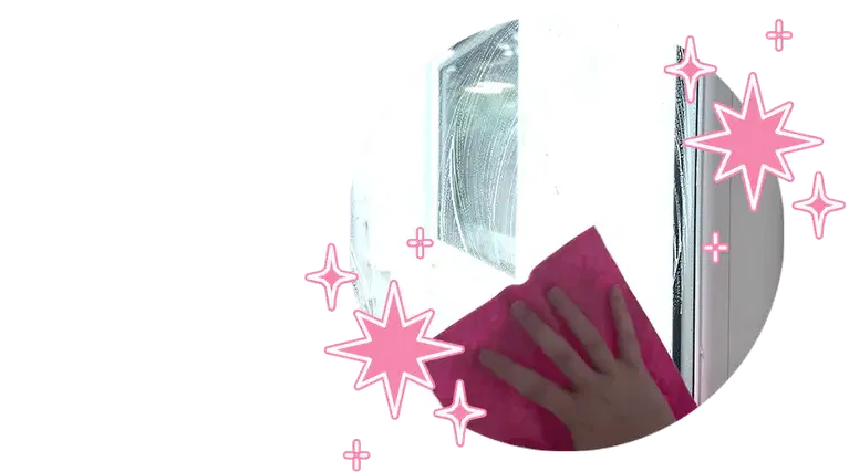smol cloth wiping a window with smol washing up liquid