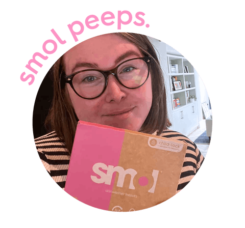 woman holding up a box of smol dishwasher tablets. text: smol peeps