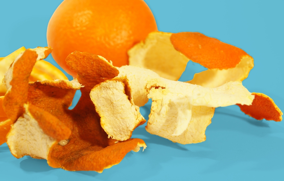 Orange peel on blue background